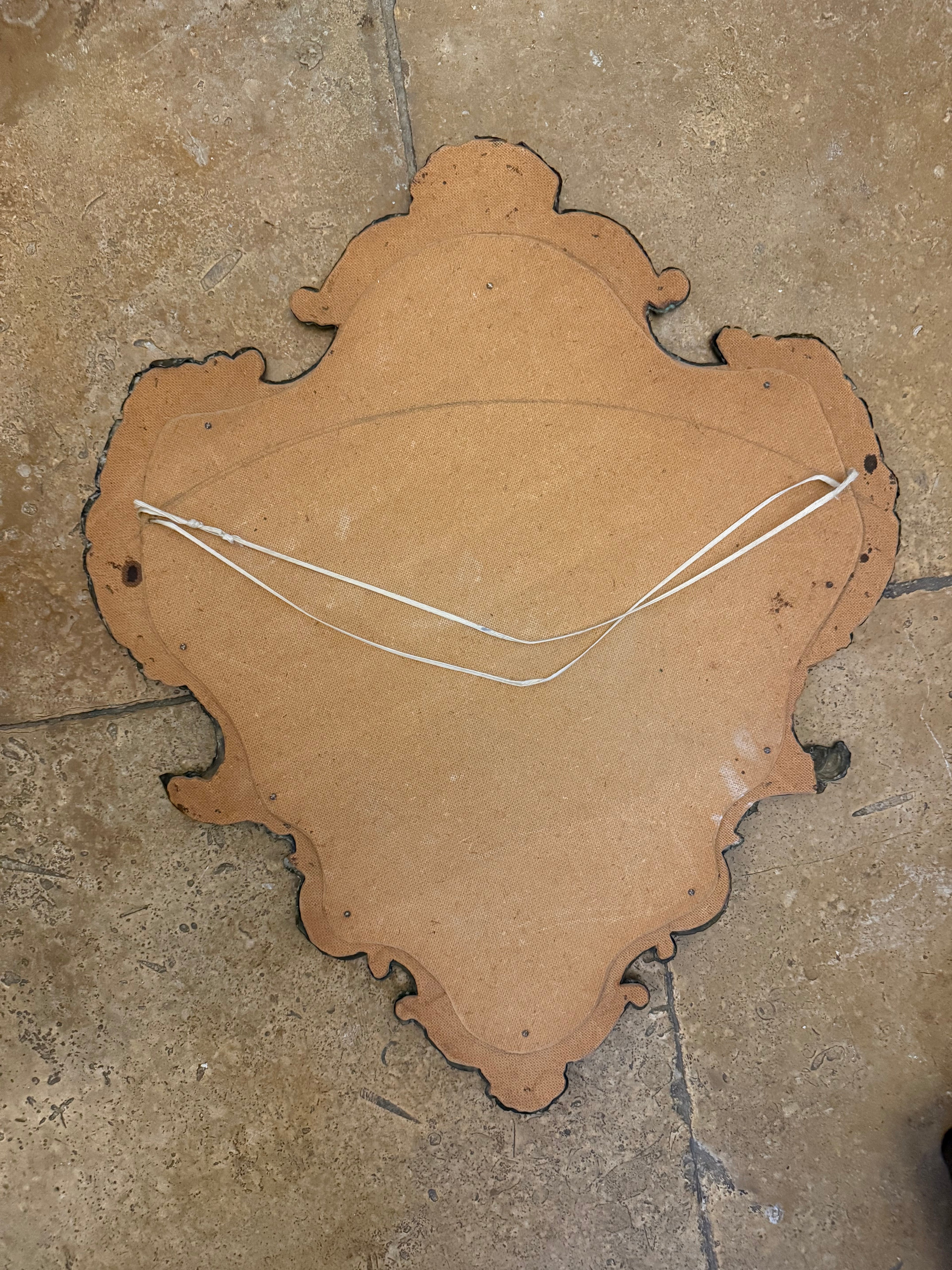 Antique hammered metal frame foxed dark mirror