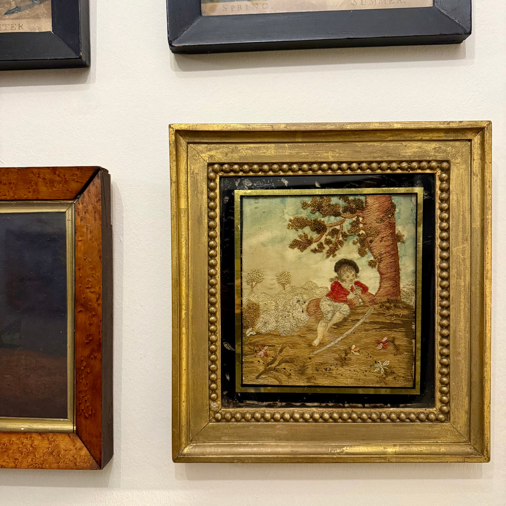 Late Georgian silkwork in original frame