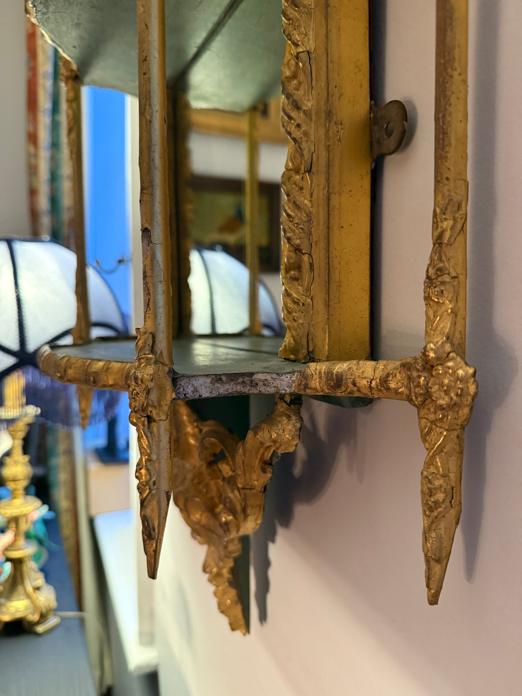 19th century gold and green mirrored wall shelf
