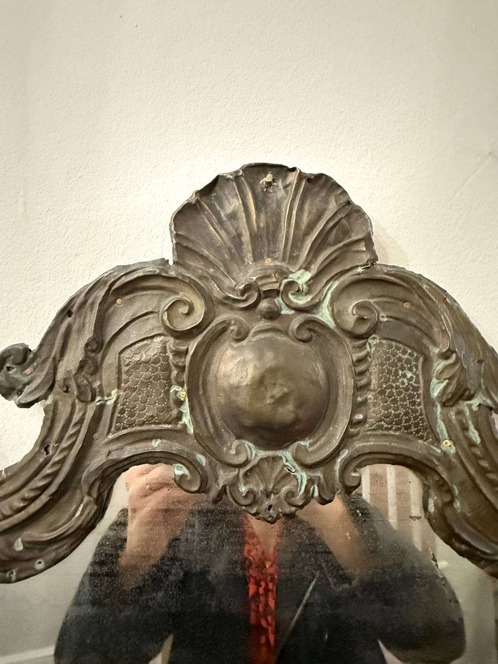 Antique hammered metal frame foxed dark mirror