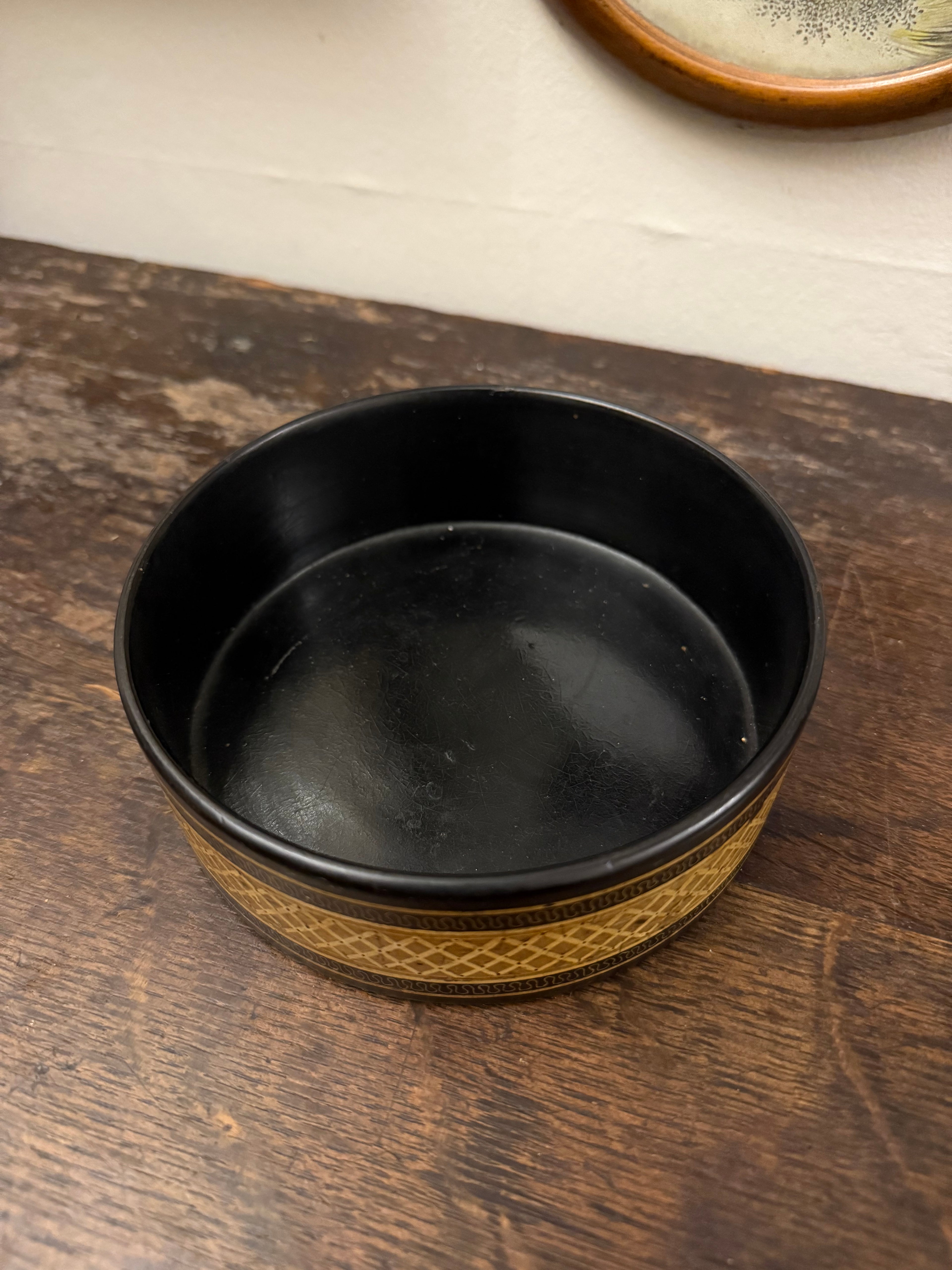 Late Georgian gold Papier Mache wine coaster