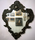 Antique hammered metal frame foxed dark mirror