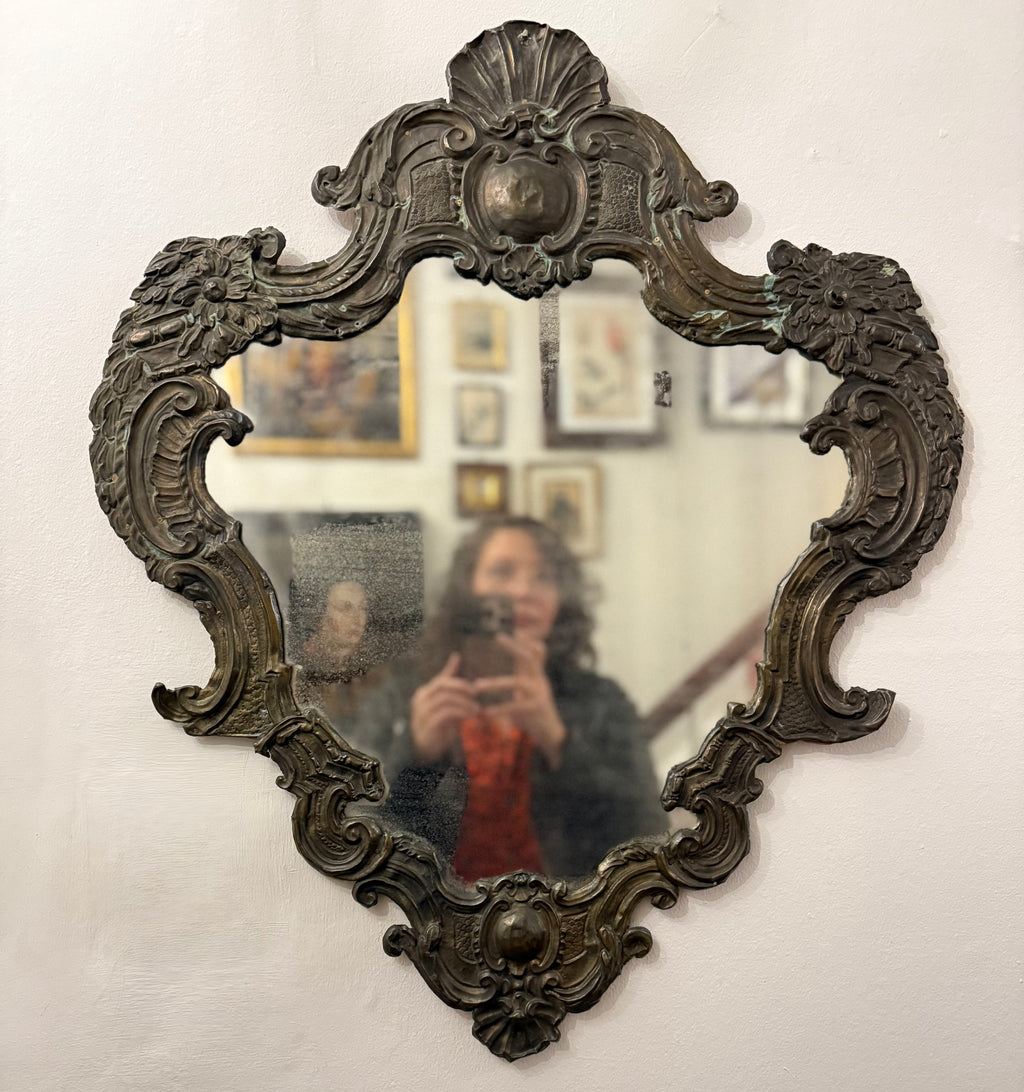 Antique hammered metal frame foxed dark mirror
